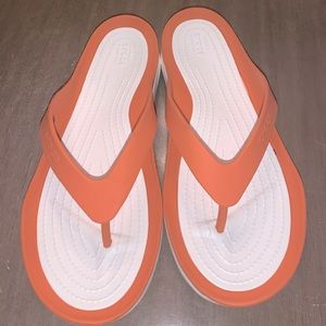 NWOT Crocs Orange Flip Flops